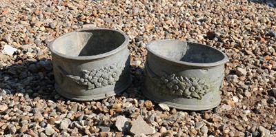 Lot 421 - A pair of small circular lead planters