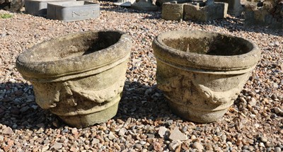 Lot 425 - A pair of composite stone weathered garden urns