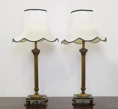 Lot 210 - A pair of brass Corinthian column table lamps and shades