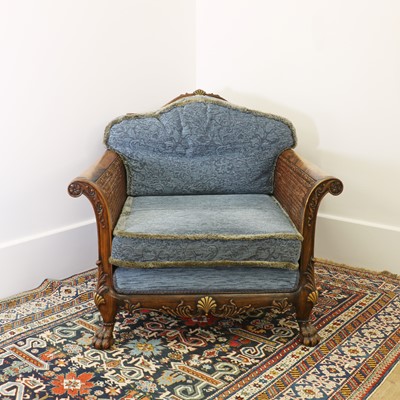 Lot 20 - A walnut library chair