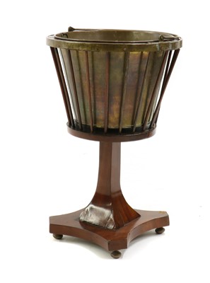 Lot 317 - A mahogany wine cooler or jardiniere
