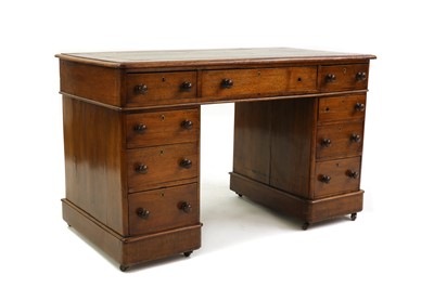 Lot 347 - A Victorian oak pedestal desk