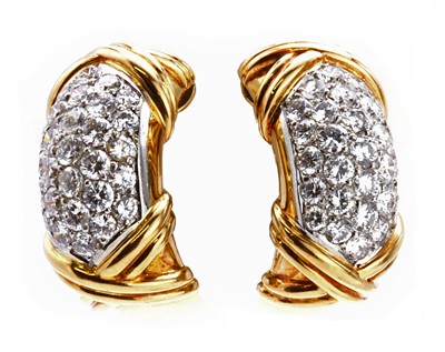 Lot 286 - A pair of French two colour gold pavé set diamond earrings, by FRED of Paris