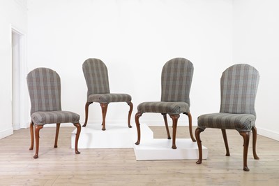 Lot 81 - A set of four George I walnut side chairs