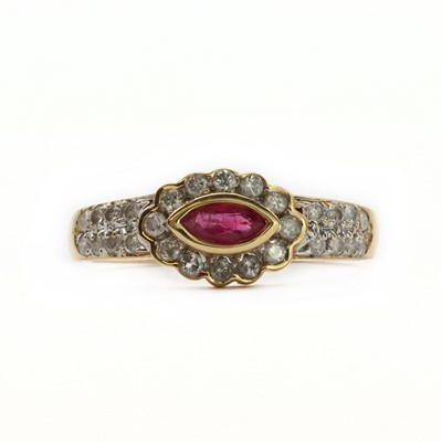 Lot 86 - An 18ct gold ruby and diamond cluster ring