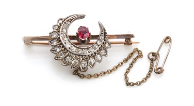 Lot 26 - A late Victorian ruby and diamond crescent bar brooch