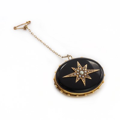 Lot 13 - A Victorian gold onyx and split pearl memorial brooch