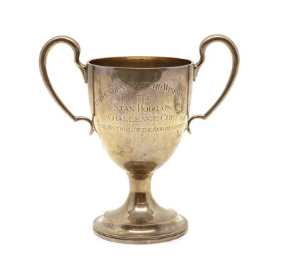 Lot 60 - A silver twin-handled trophy cup