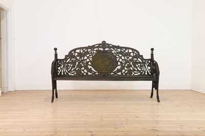 Lot 666 - A large Victorian-style cast iron garden bench