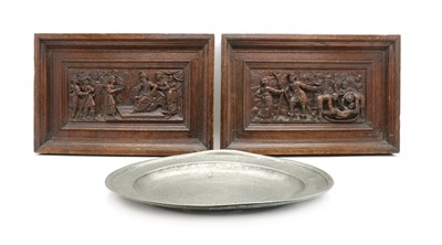 Lot 224 - A pair of relief carved oak panels