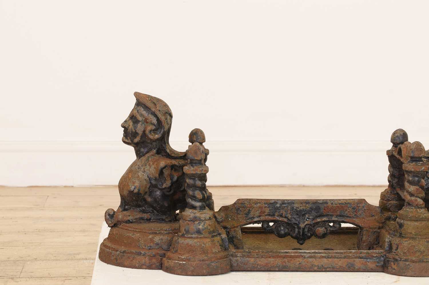 Lot 675 - A Victorian-style cast iron boot scraper