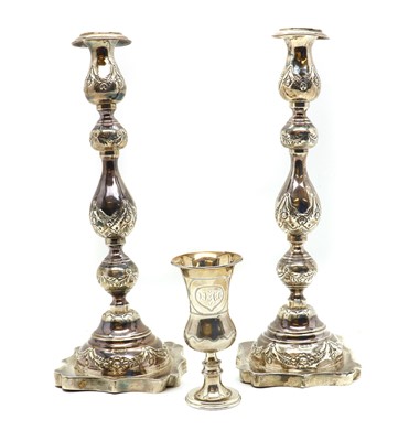 Lot 55 - A pair of silver candlesticks
