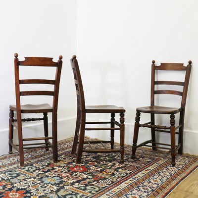 Lot 23 - A set of eight beech and elm spindle back chairs