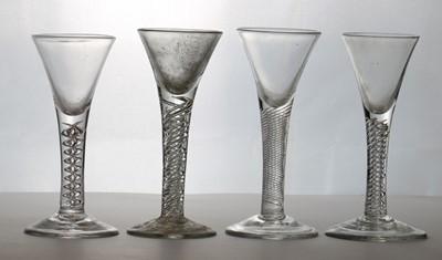 Lot 187 - A group of four air twist wine glasses