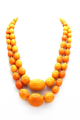 Lot 112 - A two row graduated Butterscotch amber bead necklace