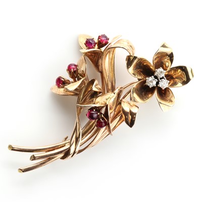 Lot 170 - A three colour gold diamond and ruby spray brooch, c.1940