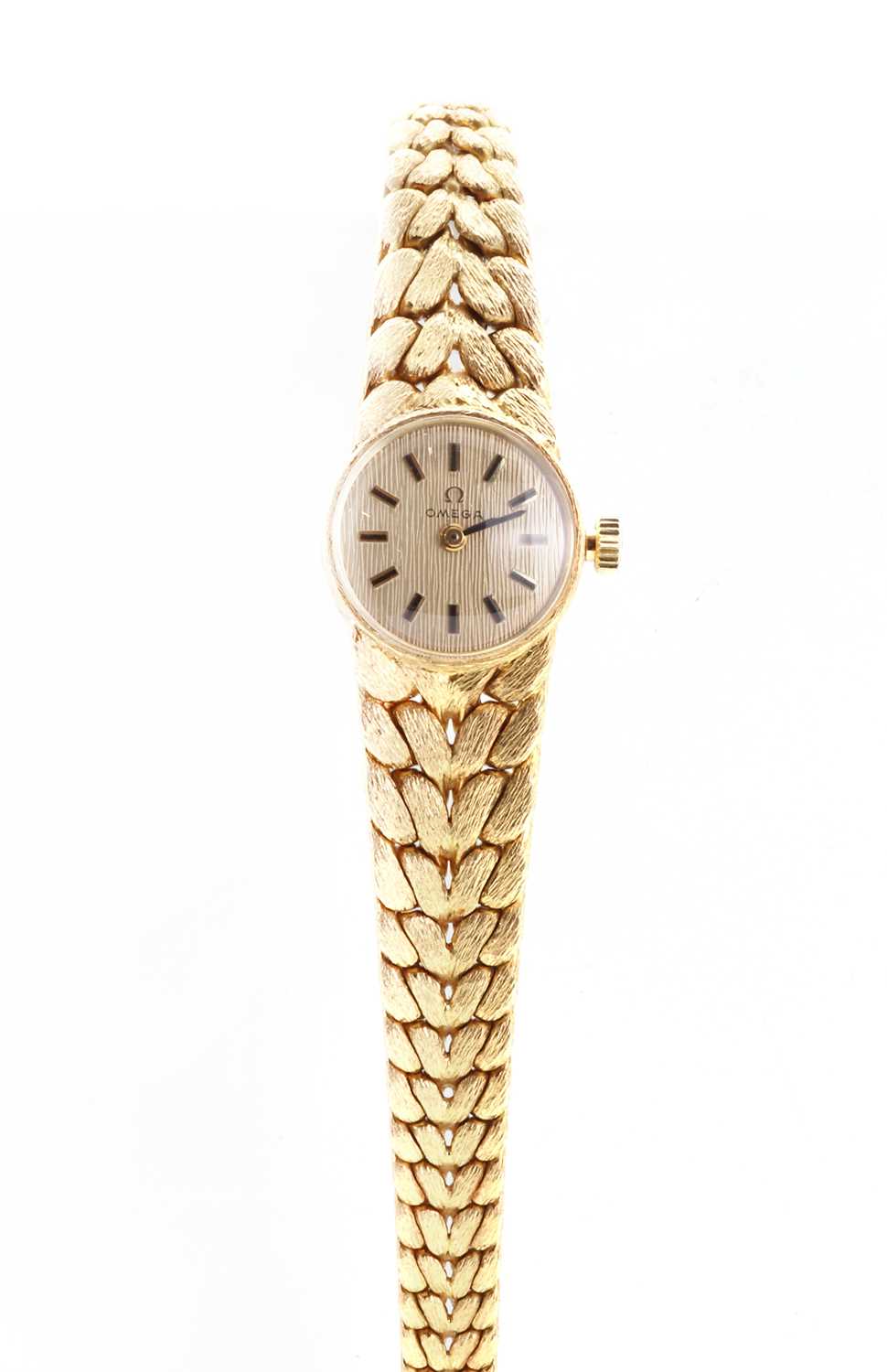 Lot 549 A ladies' 18ct gold Omega mechanical