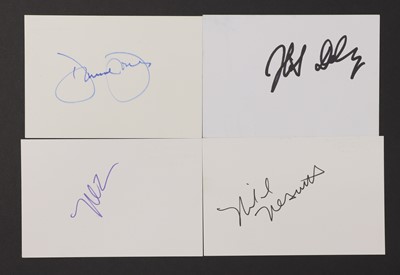 Lot 210 - The Monkees: four autographs on white card