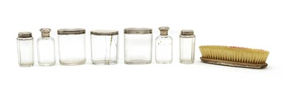 Lot 96 - A group of seven silver and cut glass dressing table jars