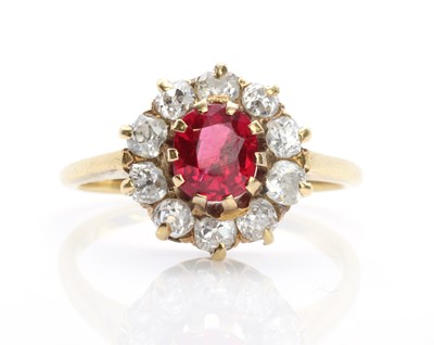 Lot 84 - An Edwardian synthetic ruby and diamond cluster ring