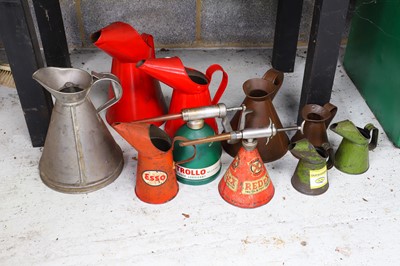Lot 11 - Various pre-war copper, aluminium and liveried tin oil jugs