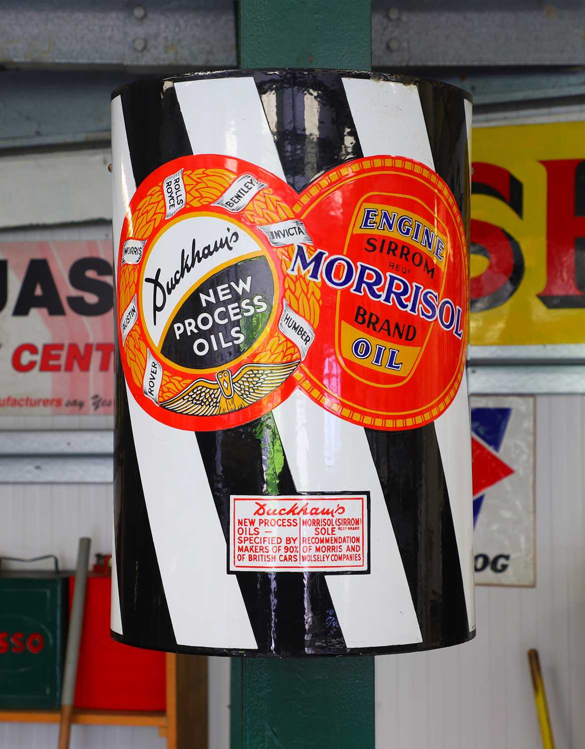 Lot 22 - A Duckhams and Morrisol single-sided curved five-colour enamel advertising sign