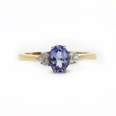 Lot 129 - An 18ct gold tanzanite and diamond ring