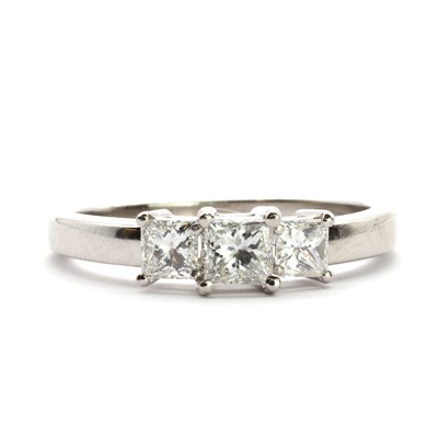 Lot 68 - A platinum three stone diamond ring