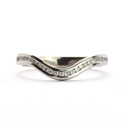 Lot 80 - A platinum diamond set half eternity ring