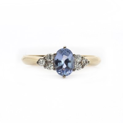 Lot 125 - A 9ct gold sapphire and diamond ring