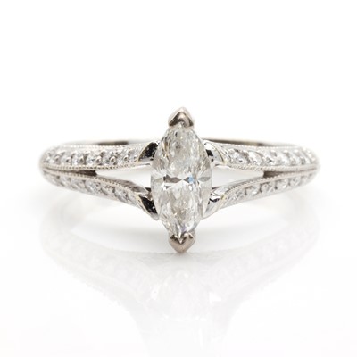 Lot 111 - A marquise diamond and 18ct white gold ring