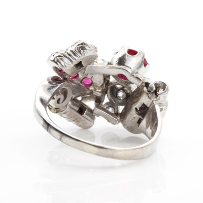 Lot 166 - An abstract diamond and synthetic ruby ring