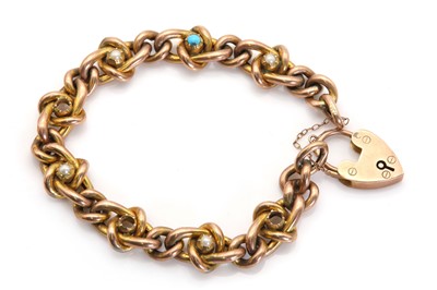 Lot 32 - A late Victorian gold bracelet with padlock