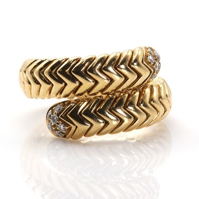 Lot 163 - A gold diamond set 'Spiga' ring, by Bulgari