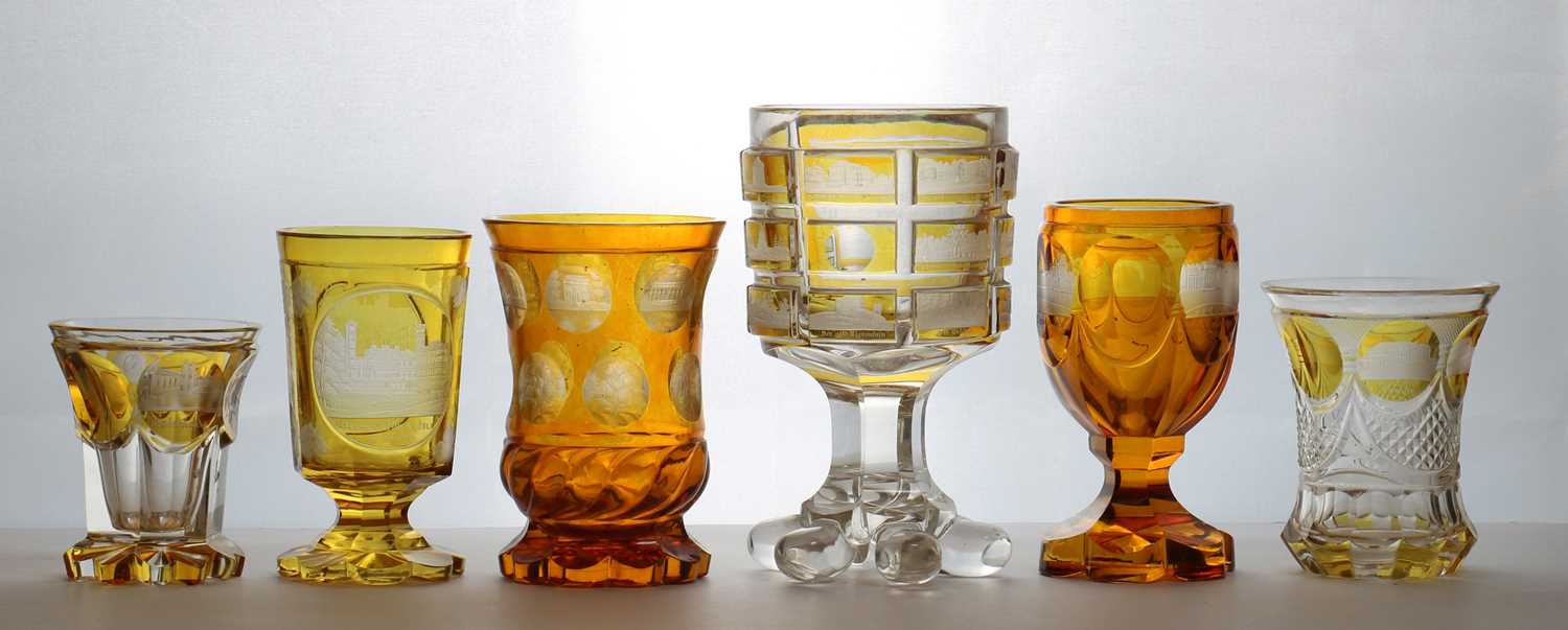 Lot 216 - A group of six Bohemian amber flashed glass