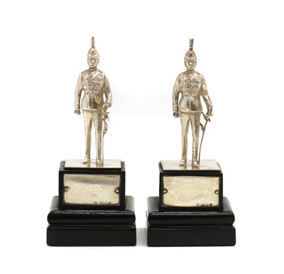 Lot 78 - A pair of silver models of fusilier soldiers