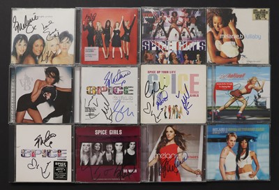 Lot 317 - A collection of signed Spice Girls memorabilia