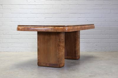 Lot 174 - An Art Deco walnut dining table