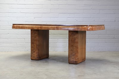 Lot 174 - An Art Deco walnut dining table