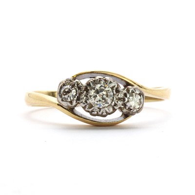 Lot 36 - A gold three stone diamond ring