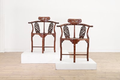 Lot 360 - A pair of carved hardwood and mother-of-pearl inlaid corner chairs