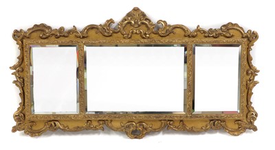 Lot 368 - A Rococo-style giltwood triptych overmantel mirror