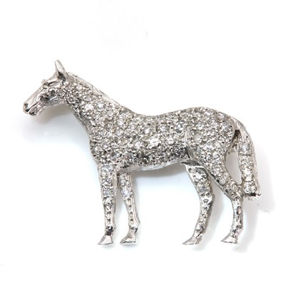 Lot 221 - An 18ct white gold diamond set horse brooch, by Alabaster and Wilson