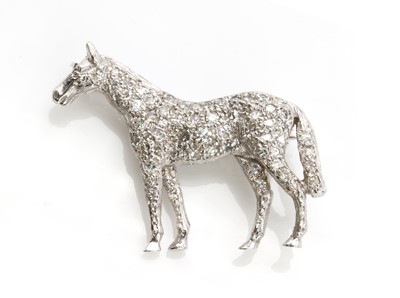 Lot 221 - An 18ct white gold diamond set horse brooch, by Alabaster and Wilson