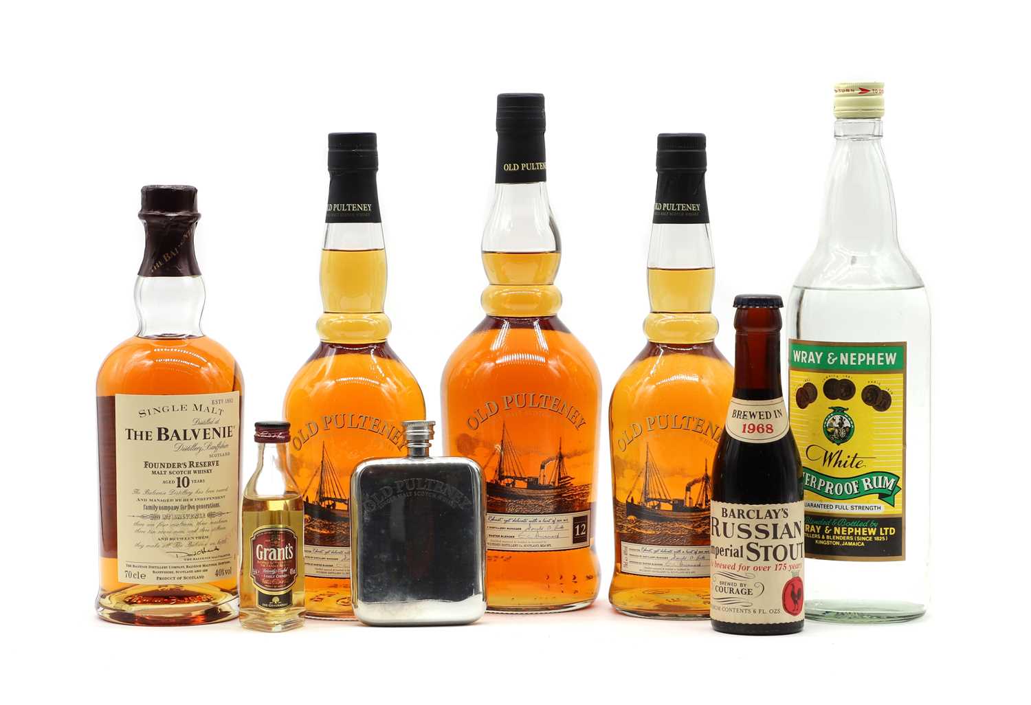 Lot 85 - A collection of whiskies and spirits,