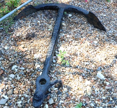 Lot 501 - A cast iron anchor