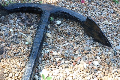 Lot 501 - A cast iron anchor