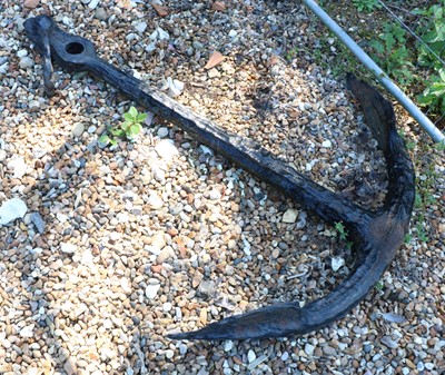 Lot 501 - A cast iron anchor