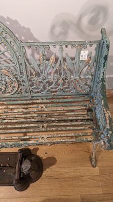 Lot 668 - A Victorian painted cast iron garden bench