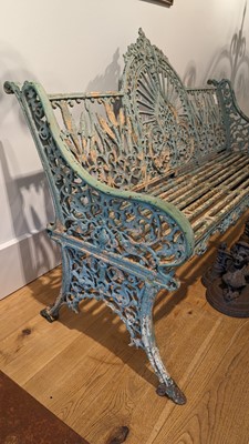 Lot 668 - A Victorian painted cast iron garden bench